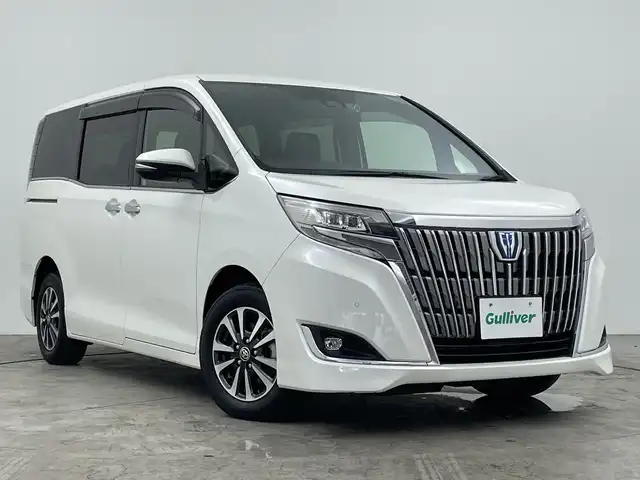 トヨタ エスクァイア ハイブリッド Gi 三重県 2020(令2)年 5.4万km ホワイトパールクリスタルシャイン 純正ナビ/・フルセグ/AM/FM/CD/DVD/HDMI/Bluetooth/前席シートヒーター/レーダークルーズコントロール/両側パワースライドドア/バックモニター/純正フリップダウンモニター/前後ドライブレコーダー/トヨタセーフティセンス/オートライト/オートハイビーム/ビルトインETC/サンシェード/LEDヘッドライト/エンジンスターター/純正16インチAW