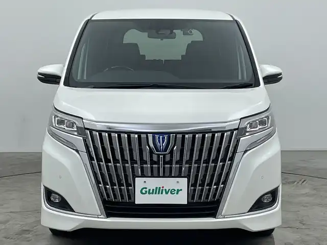 トヨタ エスクァイア ハイブリッド Gi 三重県 2020(令2)年 5.4万km ホワイトパールクリスタルシャイン 純正ナビ/・フルセグ/AM/FM/CD/DVD/HDMI/Bluetooth/前席シートヒーター/レーダークルーズコントロール/両側パワースライドドア/バックモニター/純正フリップダウンモニター/前後ドライブレコーダー/トヨタセーフティセンス/オートライト/オートハイビーム/ビルトインETC/サンシェード/LEDヘッドライト/エンジンスターター/純正16インチAW