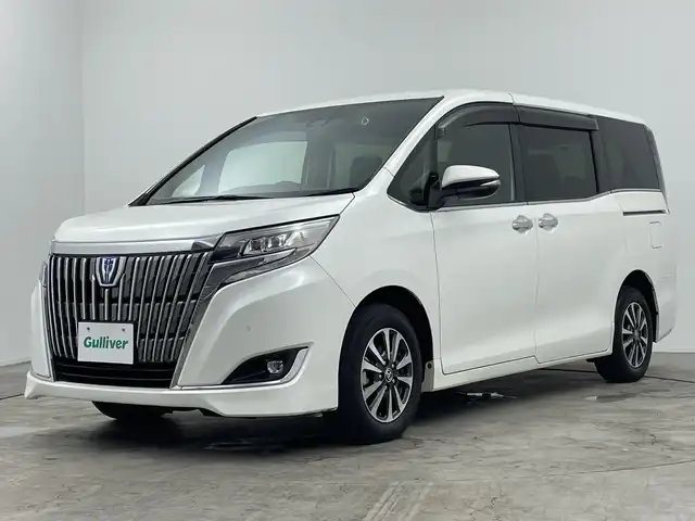 トヨタ エスクァイア ハイブリッド Gi 三重県 2020(令2)年 5.4万km ホワイトパールクリスタルシャイン 純正ナビ/・フルセグ/AM/FM/CD/DVD/HDMI/Bluetooth/前席シートヒーター/レーダークルーズコントロール/両側パワースライドドア/バックモニター/純正フリップダウンモニター/前後ドライブレコーダー/トヨタセーフティセンス/オートライト/オートハイビーム/ビルトインETC/サンシェード/LEDヘッドライト/エンジンスターター/純正16インチAW