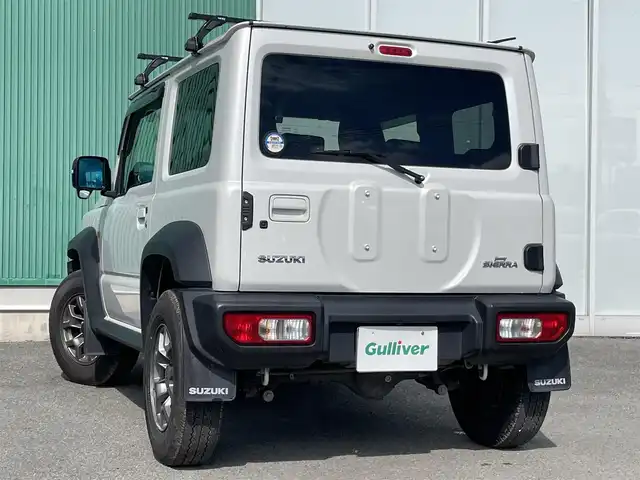スズキ ジムニー シエラ JC 福岡県 2023(令5)年 3.9万km ピュアホワイトP ワンオーナー/Panasonicナビ/（BT/フルセグ/AM/FM/DISC/SD/SDREC/iPod)/Bカメラ/クルーズコントロール/LEDヘッドライト/オートライト/DN席シートヒーター/シートカバー/純正15インチAW/アイドリングストップ/ルーフキャリア/スペアタイヤ/横滑り防止装置/レーンキープアシスト/盗難防止装置/衝突被害軽減ブレーキ/ドライブレコーダー/スマートキー/ETC/保証書/取扱説明書