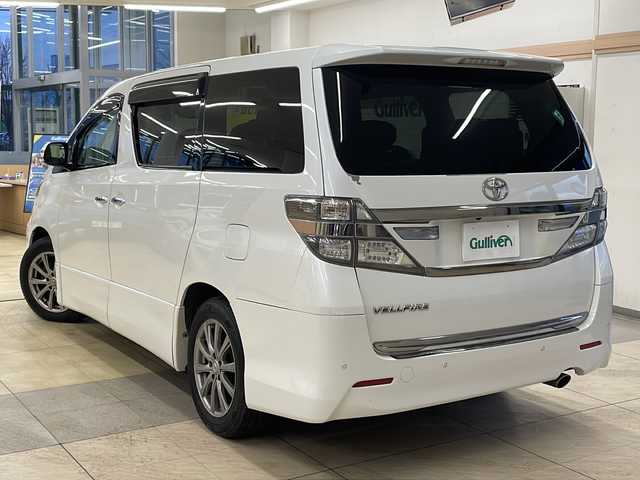 トヨタ ヴェルファイア 2．4Z Gエディション 道央・札幌 2013(平25)年 7万km ホワイトパールクリスタルシャイン ・4WD/・社外ナビ/フルセグTV/DVD/CD/SD/BT/・バックカメラ/・パワーバックドア/・両側パワースライドドア/・ALPINEリヤフリップダウンモニター/・社外エンジンスターター/・ドライブレコーダー/・クルーズコントロール/・パーキングセンサー/・横滑り防止/・ビルトインETC/・前席パワーシート/・HID/・フロントフォグ/・プッシュスタート/・スマートキー/・ドアバイザー/・電格ミラー/・夏タイヤ純正18インチAW積込