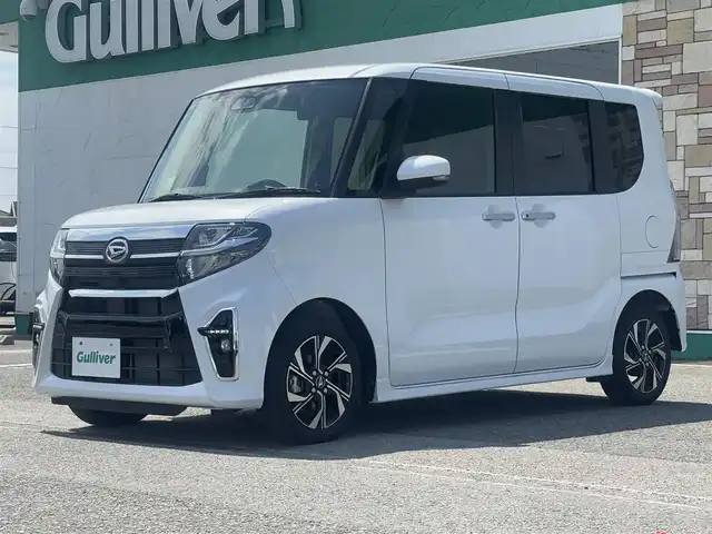ダイハツ タント カスタム X 徳島県 2022(令4)年 1.3万km シャイニングホワイトパール 純正ディスプレイオーディオ/両側パワースライドドア/次世代スマートアシスト/・衝突回避・軽減ブレーキ機能/・オートハイビーム/・サイドビューランプ/・誤発進抑制機能/・車線逸脱警報＆車線逸脱抑制制御機能/・ふらつき警報/・先行車発進お知らせ機能/・進入禁止標識認識機能/前席シートヒーター/純正アルミホイール/オートエアコン/ハーフレザーシート