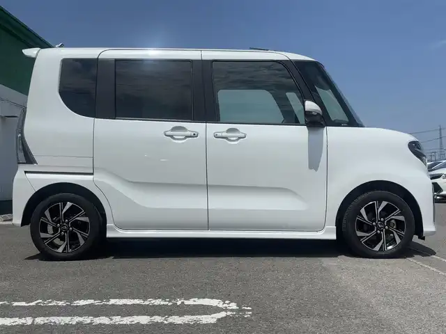 ダイハツ タント カスタム X 徳島県 2022(令4)年 1.3万km シャイニングホワイトパール 純正ディスプレイオーディオ/両側パワースライドドア/次世代スマートアシスト/・衝突回避・軽減ブレーキ機能/・オートハイビーム/・サイドビューランプ/・誤発進抑制機能/・車線逸脱警報＆車線逸脱抑制制御機能/・ふらつき警報/・先行車発進お知らせ機能/・進入禁止標識認識機能/前席シートヒーター/純正アルミホイール/オートエアコン/ハーフレザーシート