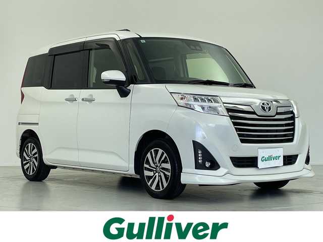 トヨタ ルーミー カスタムG 愛知県 2019(令1)年 1.6万km パールホワイトⅢ 純正ナビ/・フルセグ/・Bluetooth/・CD/・DVD/バックカメラ/両側パワースライドドア/クルーズコントロール/前後ドライブレコーダー/ＥＴＣ/衝突軽減ブレーキ/コーナーセンサー/横滑り防止装置/車線逸脱警告/先行車発進ブザー/ステアリングスイッチ/LEDヘッドライト/オートライト/オートハイビーム/フォグランプ/アイドリングストップ/スマートキー/スペアキー
