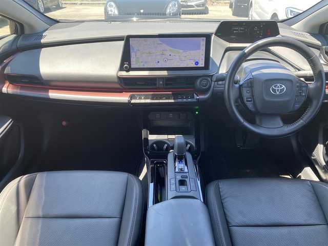トヨタ プリウス Z 福岡県 2023(令5)年 1.8万km アティチュードブラックマイカ ・ワンオーナー/・Plugin Hybrid/・純正12.3インチSDナビ/Apple Car Play/Android Auto/フルセグTV/BT/USB/・パノラミックビューモニター/・AC100V端子/・モデリスタエアロ（フロント・サイド・リア）/・Toyota Safety Sense/ープリクラッシュセーフティ/ーレーントレーシングアシスト/ーレーンデパーチャーアラート/ープロアクティブドライビングアシスト/ーフロントクロストラフィックアラート/ーロードサインアシスト/ーレーダークルーズコントロール/・BSM/・パワーバックドア/・ブラックレザーシート/・D席パワーシート/メモリーシート/・前席シートヒーター/ベンチレーション/・ステアリングヒーター/・ビルトインETC2.0/・ワイヤレス充電/・LED AUTOヘッドライト/・AUTO ハイビーム/・純正19インチAW/・スマートキー/・ドアバイザー/・保証書/取扱説明書/・スペアキー