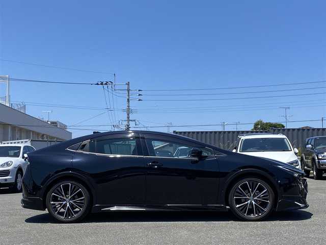 トヨタ プリウス Z 福岡県 2023(令5)年 1.8万km アティチュードブラックマイカ ・ワンオーナー/・Plugin Hybrid/・純正12.3インチSDナビ/Apple Car Play/Android Auto/フルセグTV/BT/USB/・パノラミックビューモニター/・AC100V端子/・モデリスタエアロ（フロント・サイド・リア）/・Toyota Safety Sense/ープリクラッシュセーフティ/ーレーントレーシングアシスト/ーレーンデパーチャーアラート/ープロアクティブドライビングアシスト/ーフロントクロストラフィックアラート/ーロードサインアシスト/ーレーダークルーズコントロール/・BSM/・パワーバックドア/・ブラックレザーシート/・D席パワーシート/メモリーシート/・前席シートヒーター/ベンチレーション/・ステアリングヒーター/・ビルトインETC2.0/・ワイヤレス充電/・LED AUTOヘッドライト/・AUTO ハイビーム/・純正19インチAW/・スマートキー/・ドアバイザー/・保証書/取扱説明書/・スペアキー