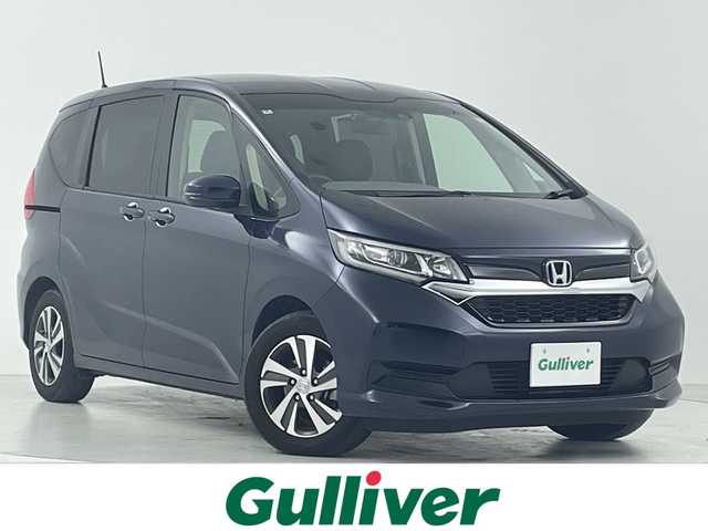 ホンダ フリード G ホンダセンシング 大阪府 2022(令4)年 3.2万km ミッドナイトブルービームM Honda SENSING/・衝突軽減ブレーキ/・車線維持システム/・アダプティブ・クルーズ・コントロール/・トラフィックジャムアシスト/・路外逸脱抑制機能/・後方誤発進抑制機能/純正ナビ/　CD/BT/バック・サイドカメラ/両側パワースライドドア/LEDオートライト/ハーフレザーシート/前席シートヒーター/純正15インチアルミホイール/後方コーナーセンサー/スマートキー/ビルトインETC/ステアリングスイッチ/革巻きステアリング/アイドリングストップ/電動格納ウィンカーミラー/純正フロアマット/後席サンシェード/ISOFIX