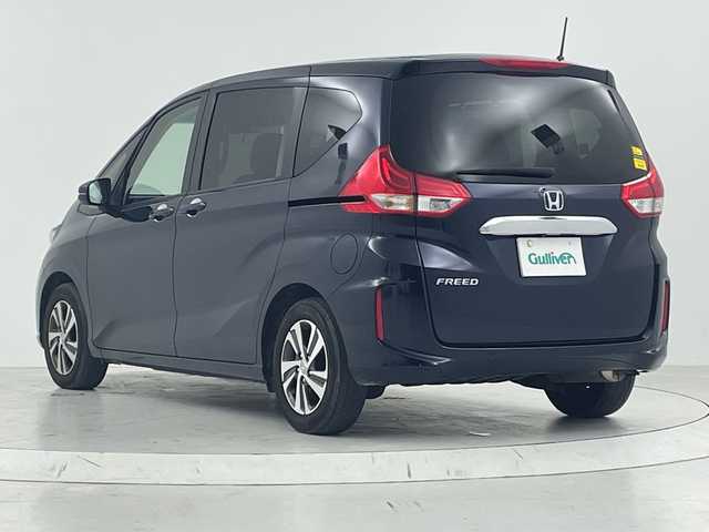 ホンダ フリード G ホンダセンシング 大阪府 2022(令4)年 3.2万km ミッドナイトブルービームM Honda SENSING/・衝突軽減ブレーキ/・車線維持システム/・アダプティブ・クルーズ・コントロール/・トラフィックジャムアシスト/・路外逸脱抑制機能/・後方誤発進抑制機能/純正ナビ/　CD/BT/バック・サイドカメラ/両側パワースライドドア/LEDオートライト/ハーフレザーシート/前席シートヒーター/純正15インチアルミホイール/後方コーナーセンサー/スマートキー/ビルトインETC/ステアリングスイッチ/革巻きステアリング/アイドリングストップ/電動格納ウィンカーミラー/純正フロアマット/後席サンシェード/ISOFIX
