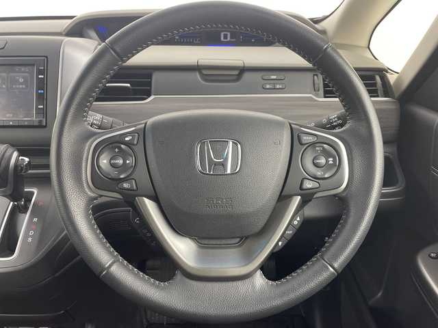 ホンダ フリード G ホンダセンシング 大阪府 2022(令4)年 3.2万km ミッドナイトブルービームM Honda SENSING/・衝突軽減ブレーキ/・車線維持システム/・アダプティブ・クルーズ・コントロール/・トラフィックジャムアシスト/・路外逸脱抑制機能/・後方誤発進抑制機能/純正ナビ/　CD/BT/バック・サイドカメラ/両側パワースライドドア/LEDオートライト/ハーフレザーシート/前席シートヒーター/純正15インチアルミホイール/後方コーナーセンサー/スマートキー/ビルトインETC/ステアリングスイッチ/革巻きステアリング/アイドリングストップ/電動格納ウィンカーミラー/純正フロアマット/後席サンシェード/ISOFIX