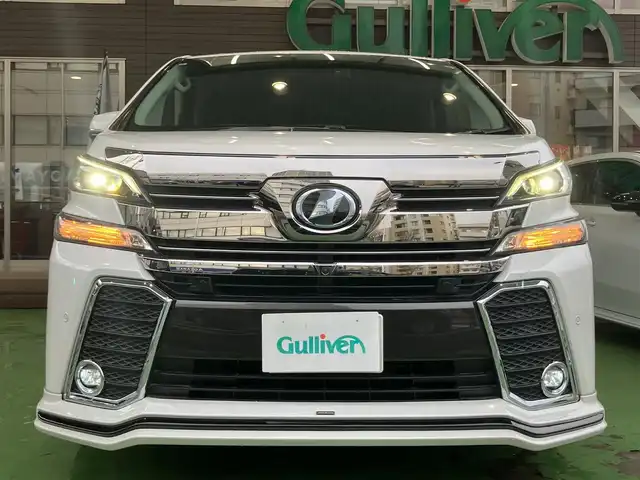 トヨタ ヴェルファイア Z Gエディション 神奈川県 2016(平28)年 8.9万km ホワイトパールクリスタルシャイン JBLサウンドシステム/純正10型ナビ/・AM/FM SD CD BT フルセグTV/レーダークルーズコントロール/nanoeオートエアコン/両側電動スライドドア/パワーバックドア/電動パーキングブレーキ/オートブレーキホールド/アラウンドビューカメラ/ETC/インテリジェントクリアランスソナー/ハーフレザーシート/助手席パワーオットマン/ステアリングヒーター/LEDヘッドライト/LEDイルミネーション/後席サンシェード/自動防眩ミラー