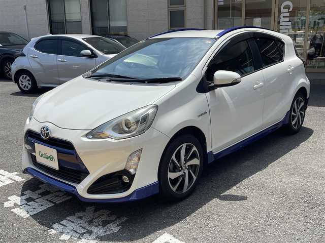 トヨタ アクア X－URBAN 静岡県 2015(平27)年 12.6万km ライムホワイトパールクリスタルシャイン ワンオーナー/純正9インチナビ/フルセグTV/DVD/CD/SD/MSV/BT/HDMI/バックカメラ/ハーフレザーシート/前席シートヒーター /エンジンスターター/前後ドライブレコーダー/ビルトインETC/ステアリングスイッチ/TVキャンセラー/LEDヘッドライト/LEDフォグライト/スマートキー×2/保証書/取扱説明書/ナビ取扱説明書/H30/31/R2/4/6/7点検記録簿有