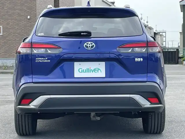 トヨタ カローラ クロス ハイブリッド Z 道央・札幌 2022(令4)年 0.9万km ダークブルーマイカM ４WD/純正ディスプレイオーディオ/AM/FM/USB/BT/トヨタセーフティセンス/プリクラッシュセーフティ/横滑り防止装置/レーダークルーズコントロール/レーンキープアシスト/クリアランスソナー/ブラインドスポットモニター/パーキングサポートブレーキ/リヤクロストラフィックアラート/ロードサインアシスト/パノラミックビューモニター/ビルトインETC/EVMODE/DRIVEMODE切替/パワーバックドア/D席パワーシート/前席シートヒーター/ハーフレザーシート/革巻きステアリング/ステアリングリモコン/電動パーキング/ブレーキホールド/自動防眩ミラー/プッシュスタート/スマートキー/LEDヘッドライト/オートライト/オートハイビーム/フォグランプ/電動格納ミラー/ヒーテッドドアミラー/ウィンカーミラー/フロアマット/レンタカー登録