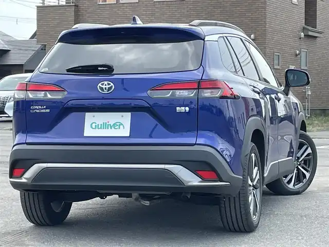トヨタ カローラ クロス ハイブリッド Z 道央・札幌 2022(令4)年 0.9万km ダークブルーマイカM ４WD/純正ディスプレイオーディオ/AM/FM/USB/BT/トヨタセーフティセンス/プリクラッシュセーフティ/横滑り防止装置/レーダークルーズコントロール/レーンキープアシスト/クリアランスソナー/ブラインドスポットモニター/パーキングサポートブレーキ/リヤクロストラフィックアラート/ロードサインアシスト/パノラミックビューモニター/ビルトインETC/EVMODE/DRIVEMODE切替/パワーバックドア/D席パワーシート/前席シートヒーター/ハーフレザーシート/革巻きステアリング/ステアリングリモコン/電動パーキング/ブレーキホールド/自動防眩ミラー/プッシュスタート/スマートキー/LEDヘッドライト/オートライト/オートハイビーム/フォグランプ/電動格納ミラー/ヒーテッドドアミラー/ウィンカーミラー/フロアマット/レンタカー登録