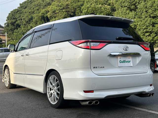 トヨタ エスティマ アエラス プレミアム 大阪府 2016(平28)年 3.3万km ホワイトパールクリスタルシャイン フリップダウンモニター/TRDエアロ/純正9インチナビ(BT/フルセグ/DVD)/バックモニター/クルーズコントロール/プリクラッシュセーフティー/レーンキープアシスト/盗難防止装置/両側パワースライドドア/ビルトインETC/LEDヘッドライト/オートライト/オートマチックハイビーム/ドライブレコーダー/パワーシート/オットマン/１００W/純正フロアマット/社外アルミホイール/スペアキー