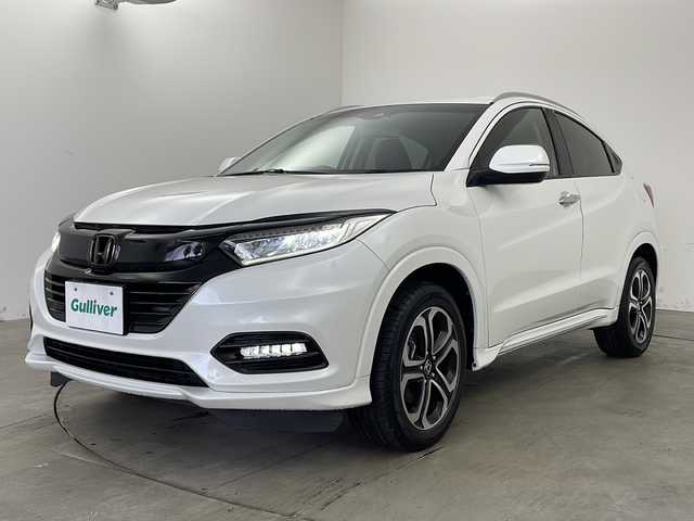 ホンダ ヴェゼル ハイブリッド Z ホンダセンシング 兵庫県 2019(平31)年 6.2万km プラチナホワイトパール ・純正９インチナビ/CD/DVD/SD/Bluetooth/TV/・バックカメラ/・社外デジタルインナーミラー/・社外前後ドライブレコーダー/・パドルシフト/・前席シートヒーター/・Honda SENSING/・衝突軽減ブレーキ〈CMBS〉/・誤発進抑制機能/・歩行者事故低減ステアリング/・路外逸脱抑制機能/・ACC〈アダプティブ・クルーズ・コントロール〉/・LKAS〈車線維持支援システム〉/・先行車発進お知らせ機能/・標識認識機能/・パドルシフト/・LEDライト/・LEDフォグランプ/・ビルトインETC2.0/・ハーフレザーシート/・スマートキー/・コンフォートビューパッケージ/・フロントワイパーデアイサー/・ドアミラーヒーター/・純正フロアマット/・17インチ純正アルミホイール/・スペアキー/・取扱説明書/・保証書