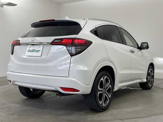 ホンダ ヴェゼル ハイブリッド Z ホンダセンシング 兵庫県 2019(平31)年 6.2万km プラチナホワイトパール ・純正９インチナビ/CD/DVD/SD/Bluetooth/TV/・バックカメラ/・社外デジタルインナーミラー/・社外前後ドライブレコーダー/・パドルシフト/・前席シートヒーター/・Honda SENSING/・衝突軽減ブレーキ〈CMBS〉/・誤発進抑制機能/・歩行者事故低減ステアリング/・路外逸脱抑制機能/・ACC〈アダプティブ・クルーズ・コントロール〉/・LKAS〈車線維持支援システム〉/・先行車発進お知らせ機能/・標識認識機能/・パドルシフト/・LEDライト/・LEDフォグランプ/・ビルトインETC2.0/・ハーフレザーシート/・スマートキー/・コンフォートビューパッケージ/・フロントワイパーデアイサー/・ドアミラーヒーター/・純正フロアマット/・17インチ純正アルミホイール/・スペアキー/・取扱説明書/・保証書