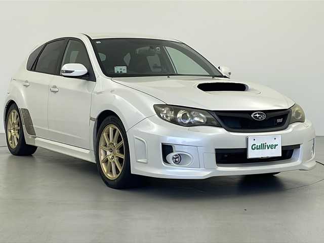 スバル インプレッサ ＷＲＸ STi 岐阜県 2010(平22)年 15.8万km サテンホワイトパール 6速MT/4WD/ターボ/ドライブレコーダー/レーダー探知機（ZERO 802V）/純正ブーストメーター/純正17インチアルミホイール/純正フロアマット/ABS/横滑り防止装置/ビークルダイナミクスコントロール/エアバック（運転席＋助手席＋サイド）/スノーキャリア見込み（ＴＨＵＬＥＴ　Ｈ７３９　）/エアロ（フロント＋リヤ）/フロントフォグランプ/電格ミラー/ハーフレザーシート/プッシュスタート/スマートキー/ETC