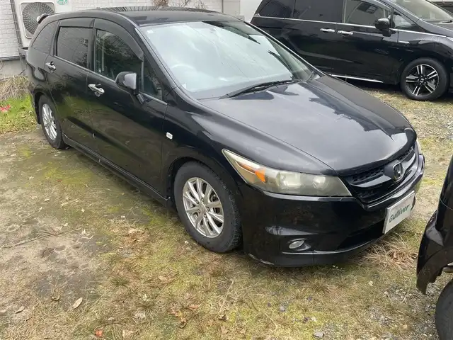 ホンダ ストリーム RSZ 新潟県 2006(平18)年 15.5万km ナイトホークブラックパール HDDナビ/社外ホイールスタッドレスタイヤ/ドアバイザー/ETC/純正フロアマット/アルパインフリップダウンモニター/ハンズフリー/ステアリングスイッチ