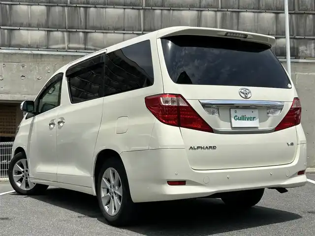 トヨタ アルファード 350G 愛知県 2008(平20)年 8.7万km ゴールドパールクリスタルシャイン 純正HDDナビ/フルセグTV・CD・DVD・SD・Bluetooth/純正フリップダウンモニター/両側パワースライドア/前席パワーシート/運転席メモリー機能付きパワーシート/ウッドコンビステアリング/助手席・二列目オットマン/クルーズコントロール（追従無し）/コーナーセンサー/ステアリングスイッチ/ビルトインETC/HIDヘッドライト(オートライト)/フォグランプ/スマートキー/プッシュスタート/横滑り防止/純正フロアマット/純正ドアバイザー/保証書