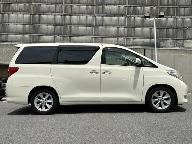 トヨタ アルファード 350G 愛知県 2008(平20)年 8.7万km ゴールドパールクリスタルシャイン 純正HDDナビ/フルセグTV・CD・DVD・SD・Bluetooth/純正フリップダウンモニター/両側パワースライドア/前席パワーシート/運転席メモリー機能付きパワーシート/ウッドコンビステアリング/助手席・二列目オットマン/クルーズコントロール（追従無し）/コーナーセンサー/ステアリングスイッチ/ビルトインETC/HIDヘッドライト(オートライト)/フォグランプ/スマートキー/プッシュスタート/横滑り防止/純正フロアマット/純正ドアバイザー/保証書