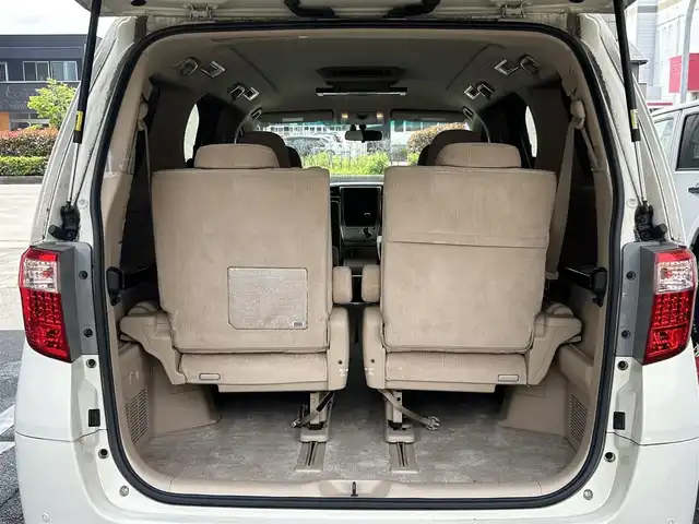 トヨタ アルファード 350G 愛知県 2008(平20)年 8.7万km ゴールドパールクリスタルシャイン 純正HDDナビ/フルセグTV・CD・DVD・SD・Bluetooth/純正フリップダウンモニター/両側パワースライドア/前席パワーシート/運転席メモリー機能付きパワーシート/ウッドコンビステアリング/助手席・二列目オットマン/クルーズコントロール（追従無し）/コーナーセンサー/ステアリングスイッチ/ビルトインETC/HIDヘッドライト(オートライト)/フォグランプ/スマートキー/プッシュスタート/横滑り防止/純正フロアマット/純正ドアバイザー/保証書
