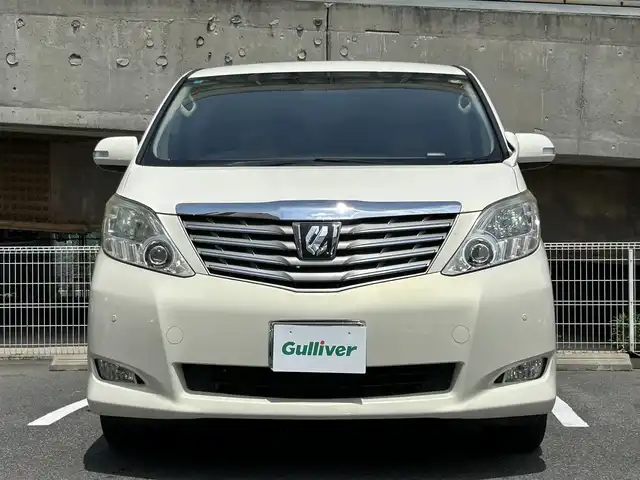 トヨタ アルファード 350G 愛知県 2008(平20)年 8.7万km ゴールドパールクリスタルシャイン 純正HDDナビ/フルセグTV・CD・DVD・SD・Bluetooth/純正フリップダウンモニター/両側パワースライドア/前席パワーシート/運転席メモリー機能付きパワーシート/ウッドコンビステアリング/助手席・二列目オットマン/クルーズコントロール（追従無し）/コーナーセンサー/ステアリングスイッチ/ビルトインETC/HIDヘッドライト(オートライト)/フォグランプ/スマートキー/プッシュスタート/横滑り防止/純正フロアマット/純正ドアバイザー/保証書