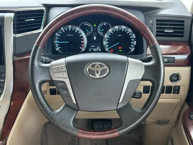 トヨタ アルファード 350G 愛知県 2008(平20)年 8.7万km ゴールドパールクリスタルシャイン 純正HDDナビ/フルセグTV・CD・DVD・SD・Bluetooth/純正フリップダウンモニター/両側パワースライドア/前席パワーシート/運転席メモリー機能付きパワーシート/ウッドコンビステアリング/助手席・二列目オットマン/クルーズコントロール（追従無し）/コーナーセンサー/ステアリングスイッチ/ビルトインETC/HIDヘッドライト(オートライト)/フォグランプ/スマートキー/プッシュスタート/横滑り防止/純正フロアマット/純正ドアバイザー/保証書