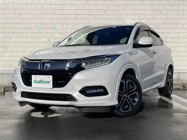 ホンダ ヴェゼル ハイブリッド Z ホンダセンシング 静岡県 2020(令2)年 6.3万km プラチナホワイトパール HondaSENSING/純正メモリーナビ(VXM-204VFi)/　AM FM CD DVD Bluetooth USB SD/フルセグTV/ビルトインETC/LEDオートヘッドランプ/レーダークルーズコントロール/ハーフレザーシート/シートヒーター(前席)/純正17インチアルミホイール/スマートキー2本/パドルシフト/パーキングアシスト/ワンオーナー/バックモニター