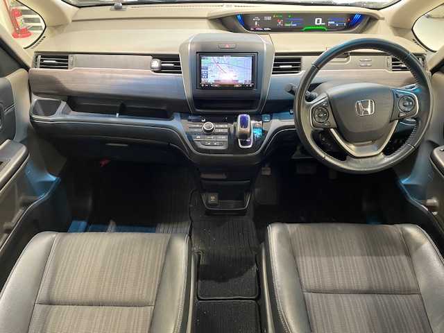 ホンダ フリード＋ ハイブリット EX 宮城県 2017(平29)年 10.4万km クリスタルブラックパール ホンダセンシング/・衝突軽減システム/・レーンキープアシスト/・CMBS/・ACC/・先行車発進お知らせ/・路外逸脱抑制機能/・標識認識機能/・車線逸脱警報装置/社外ナビ/・バックカメラ/・ETC/・Bluetooth/・CD/DVD/アイドリングストップ/革巻きステアリング/・ステアリングスイッチ/プッシュスタート/・スマートキー/純正アルミホイール/純正フロアマット/LEDヘッドライト/・フォグランプ/・オートライト