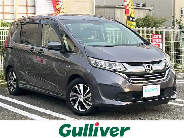 ホンダ フリード ハイブリット EX 兵庫県 2019(平31)年 5.1万km モダンスティールM ワンオーナー/純正インターナビ/CD/DVD/Bluetooth/フルセグTV/バックカメラ/ホンダセンシング/アダプティブクルーズコントロール/両側パワースライドドア/純正ドライブレコーダー/ビルトインETC/LEDヘッドランプ/オートライト/アクティブコーナリングランプ/コンフォートビューパッケージ/前席シートヒーター/ロールサンシェード/プラズマクラスター付オートエアコン/リアヒーターダクト/純正15インチAW/保証書/取説/スペアキー