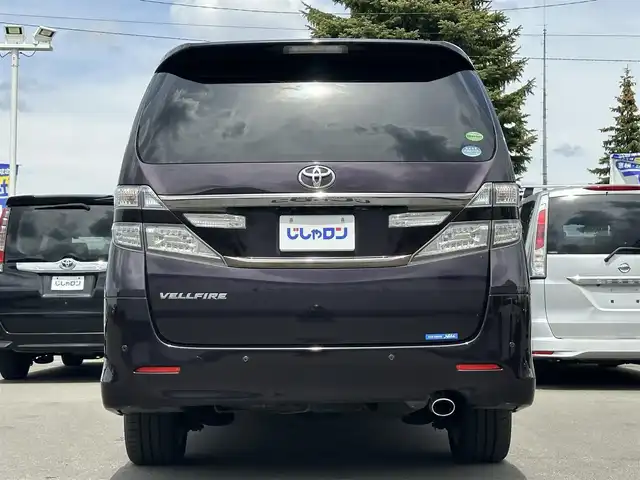トヨタ ヴェルファイア 2．4Z 道北・旭川 2013(平25)年 13.3万km ボルドーマイカメタリック (株)IDOMが運営する【じしゃロン旭川店】の自社ローン専用車両になります。こちらは現金またはオートローンご利用時の価格です。自社ローンご希望の方は別途その旨お申付け下さい/　/・純正ナビ/・ETC/・片側パワースライドドア/・フリップダウン/・スマートキー1個/・取扱説明書