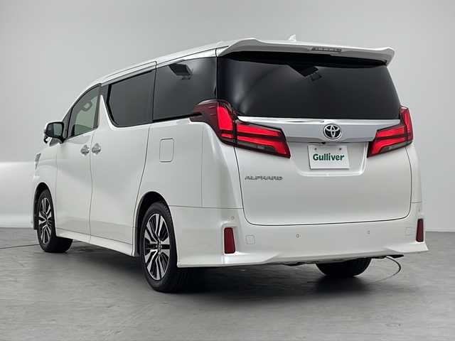 トヨタ アルファード S Cパッケージ 三重県 2018(平30)年 6.7万km ホワイトパールクリスタルシャイン 禁煙車/純正10型ナビ/AM/FM/CD/DVD/SD/BT/フルセグTV/バックカメラ/ムーンルーフ /デジタルインナーミラー /純正フリップダウンモニター /クリアランスソナー /プリクラッシュセーフティ/パーキングサポートブレーキ/レーントレーシングアシスト/ロードサインアシスト/パワーバックドア /三眼LEDヘッドライト/シートメモリー（D席）/パワーシート/オットマン/ステアリングスイッチ /レザーシート （合皮）/シートヒーター /ベンチレーション/ステアリングヒーター/純正ビルトインETC