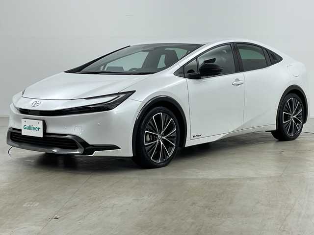 トヨタ プリウス Z 道央・札幌 2023(令5)年 1.5万km プラチナホワイトパールマイカ ・純正１２型コネクティッドナビ　/・パノラミックビューモニター　/・フルセグTV/・パワーバックドア/・ＡＣ１００Ｖアクセサリコンセント　/・パークアシスト　/・BSM/・プリクラッシュセーフティ　/・レーンキープアシスト/・オートハイビーム/・LEDヘッドライト/・リアフォグランプ/・ワイヤレス充電器　/・アダプティブクルーズコントロール　/・ワイパーデアイサー/・ステアリングヒーター/・ステアリングリモコン/・前席シートヒーター/シートベンチレーション/・メモリ機能付パワーシート/・ETC2.0/・19インチ純正アルミホイール/・保証書