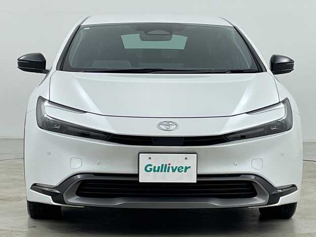トヨタ プリウス Z 道央・札幌 2023(令5)年 1.5万km プラチナホワイトパールマイカ ・純正１２型コネクティッドナビ　/・パノラミックビューモニター　/・フルセグTV/・パワーバックドア/・ＡＣ１００Ｖアクセサリコンセント　/・パークアシスト　/・BSM/・プリクラッシュセーフティ　/・レーンキープアシスト/・オートハイビーム/・LEDヘッドライト/・リアフォグランプ/・ワイヤレス充電器　/・アダプティブクルーズコントロール　/・ワイパーデアイサー/・ステアリングヒーター/・ステアリングリモコン/・前席シートヒーター/シートベンチレーション/・メモリ機能付パワーシート/・ETC2.0/・19インチ純正アルミホイール/・保証書