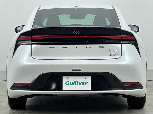 トヨタ プリウス Z 道央・札幌 2023(令5)年 1.5万km プラチナホワイトパールマイカ ・純正１２型コネクティッドナビ　/・パノラミックビューモニター　/・フルセグTV/・パワーバックドア/・ＡＣ１００Ｖアクセサリコンセント　/・パークアシスト　/・BSM/・プリクラッシュセーフティ　/・レーンキープアシスト/・オートハイビーム/・LEDヘッドライト/・リアフォグランプ/・ワイヤレス充電器　/・アダプティブクルーズコントロール　/・ワイパーデアイサー/・ステアリングヒーター/・ステアリングリモコン/・前席シートヒーター/シートベンチレーション/・メモリ機能付パワーシート/・ETC2.0/・19インチ純正アルミホイール/・保証書