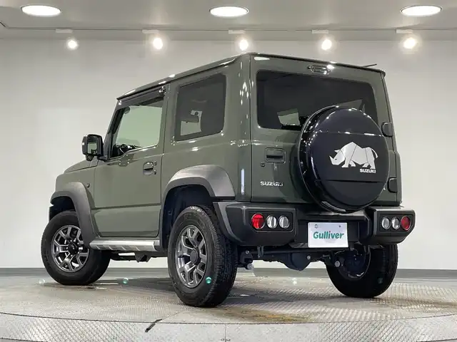 スズキ ジムニー シエラ JC 愛知県 2019(平31)年 2.1万km ジャングルグリーン 純正8インチナビ（CN-RZ846）/衝突軽減ブレーキ/ビルトインETC/シートヒーター/LEDヘッドライト/バックカメラ/クルーズコントロール/ドライブレコーダー/フルセグTV/Bluetooth/レーンキープアシスト/オートハイビーム/ダウンヒルアシスト/プッシュスタート/スマートキー/CD/DVD再生/ミュージックサーバー/純正フロアマット/純正アルミホイール/オートライト/電格ミラー/ドアバイザー/ヒーテッドドアミラー/背面タイヤ純正ハードカバー/フロントアンダーガード/サイドシルガード/4WD/トランスファーレバー/ウィンカーミラー/フォグランプ/ヘッドライトウォッシャー/横滑り防止装置/ステアリングリモコン/オートエアコン/
