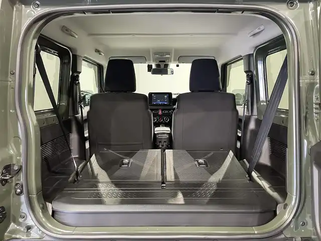 スズキ ジムニー シエラ JC 愛知県 2019(平31)年 2.1万km ジャングルグリーン 純正8インチナビ（CN-RZ846）/衝突軽減ブレーキ/ビルトインETC/シートヒーター/LEDヘッドライト/バックカメラ/クルーズコントロール/ドライブレコーダー/フルセグTV/Bluetooth/レーンキープアシスト/オートハイビーム/ダウンヒルアシスト/プッシュスタート/スマートキー/CD/DVD再生/ミュージックサーバー/純正フロアマット/純正アルミホイール/オートライト/電格ミラー/ドアバイザー/ヒーテッドドアミラー/背面タイヤ純正ハードカバー/フロントアンダーガード/サイドシルガード/4WD/トランスファーレバー/ウィンカーミラー/フォグランプ/ヘッドライトウォッシャー/横滑り防止装置/ステアリングリモコン/オートエアコン/