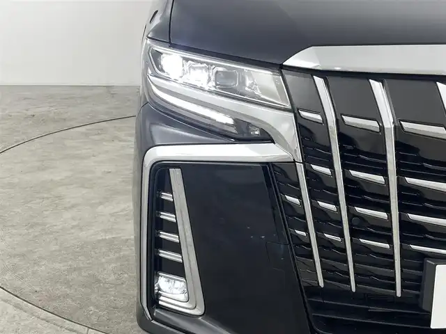 トヨタ アルファード S Cパッケージ 福島県 2022(令4)年 1.9万km ブラック トヨタセーフティセンス/・車線逸脱警報装置/・盗難防止装置/・衝突被害軽減ブレーキ/・コーナーセンサー前後/・ブラインドスポット/・デジタルインナーミラー/・レーンキープアシスト/・リアクロストラフィックアラート/・ロードサインアシスト/・レーダークルーズコントロール/・オートブレーキホールド/・電子パーキング/・オートマチックハイビーム/純正ナビ/・フルセグTV/BT/USB/DVD/AM/FM/・前後ドライブレコーダー/・バックカメラ/・ETC/両側パワースライドドア/・電動リアゲート/革張ステアリング/・ステアリングリモコン/・ステアリングヒーター/レザーシート/・D+N席パワーシート/・D+N席シートヒーター/・D+N席エアシート/ウォークスルー/・3列シート/プッシュスタート/・スマートキー/・スペアキー/LEDヘッドライト/・フォグライト/・オートライト/サンルーフ/ドアバイザー/社外22インチアルミ（FLEDERMAUS）/純正フロアマット/車高調/カーテシーライト