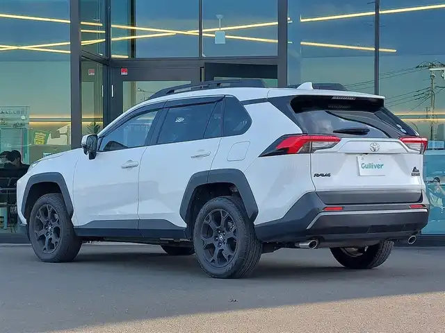 トヨタ ＲＡＶ４ アドベンチャー オフロードPKG 東京都 2021(令3)年 7.4万km スーパーホワイトⅡ セーフティセンス/プリクラッシュセーフティ/レーントレーシングアシスト/オートハイビーム/クリアランスソナー/純正9型DA/ナビ機能・BT/ルーフレール/LEDヘッドライト/フォグ/ハーフレザーシート/運転席パワーシート/シートヒーター/ベンチレーション/ビルトインETC/USBポート