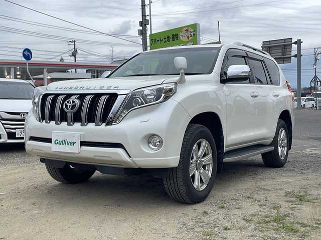 トヨタ ランドクルーザー プラド TX Lパッケージ・G－フロンティア 福島県 2017(平29)年 3.8万km ホワイトパールクリスタルシャイン ・ワンオーナー/・純正SDナビ/（Bt、ワンセグTV、DISC、FM＆AM）/・４WD/・ETC/・ドライブレコーダー/・クルーズコントロール（追従機能なし）/・横滑り防止装置/・LEDヘッドライト/・オートライト/・レザーシート/・D+N席シートヒーター/・D+N席パワーシート/・100V電源/・社外18インチAW/・純正フロアマット/・プッシュスタート/・スマートキー/・スペアキー/・純正エンジンスターター/・純正AWスタッドレスタイヤ4本積載/（265/60R18、22年製造）/・ヘッドランプクリーナー/・IDOL　UP/・排気ガス浄化/・レーダー探知機