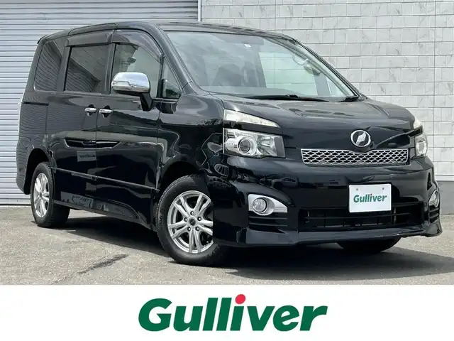 トヨタ ヴォクシー ZS 煌 道東・釧路十勝 2011(平23)年 12.8万km ブラック 4WD/寒冷地仕様/純正ナビ/地デジ/バックカメラ/ETC/両側パワースライドドア/プッシュスタート/スマートキー/パドルシフト/HIDヘッドライト/フォグランプ/ドアバイザー/革巻きステアリング/フロアマット