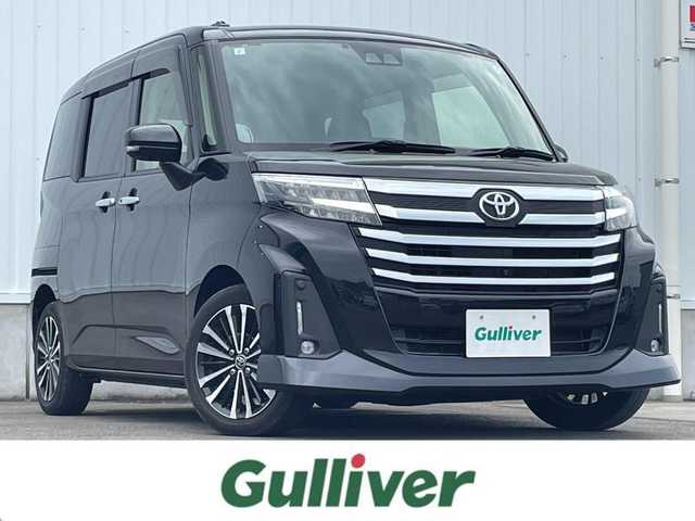 トヨタ ルーミー カスタムG－T 愛媛県 2021(令3)年 3.1万km ブラックマイカメタリック 両側パワースライドドア/パノラミックビューモニター/純正9インチナビ(Bluetooth/CD/DVD)/フルセグテレビ/ETC/レーダークルーズコントロール/アイドリングストップ/レーンキープアシスト/前後コーナーセンサー/LEDヘッドライト/オートライト/純正フロアマット/純正ドアバイザー/純正アルミホイール/横滑り防止装置/スマートキー/プッシュスタート/ABS