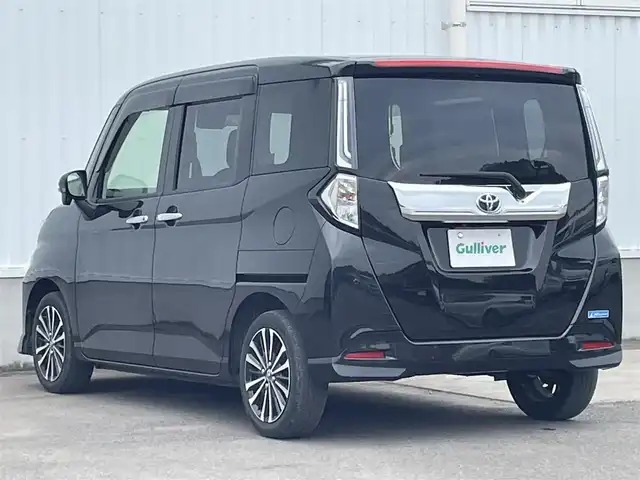 トヨタ ルーミー カスタムG－T 愛媛県 2021(令3)年 3.1万km ブラックマイカメタリック 両側パワースライドドア/パノラミックビューモニター/純正9インチナビ(Bluetooth/CD/DVD)/フルセグテレビ/ETC/レーダークルーズコントロール/アイドリングストップ/レーンキープアシスト/前後コーナーセンサー/LEDヘッドライト/オートライト/純正フロアマット/純正ドアバイザー/純正アルミホイール/横滑り防止装置/スマートキー/プッシュスタート/ABS