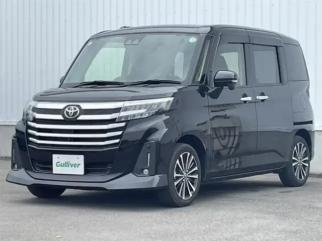 トヨタ ルーミー カスタムG－T 愛媛県 2021(令3)年 3.1万km ブラックマイカメタリック 両側パワースライドドア/パノラミックビューモニター/純正9インチナビ(Bluetooth/CD/DVD)/フルセグテレビ/ETC/レーダークルーズコントロール/アイドリングストップ/レーンキープアシスト/前後コーナーセンサー/LEDヘッドライト/オートライト/純正フロアマット/純正ドアバイザー/純正アルミホイール/横滑り防止装置/スマートキー/プッシュスタート/ABS