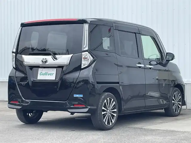 トヨタ ルーミー カスタムG－T 愛媛県 2021(令3)年 3.1万km ブラックマイカメタリック 両側パワースライドドア/パノラミックビューモニター/純正9インチナビ(Bluetooth/CD/DVD)/フルセグテレビ/ETC/レーダークルーズコントロール/アイドリングストップ/レーンキープアシスト/前後コーナーセンサー/LEDヘッドライト/オートライト/純正フロアマット/純正ドアバイザー/純正アルミホイール/横滑り防止装置/スマートキー/プッシュスタート/ABS