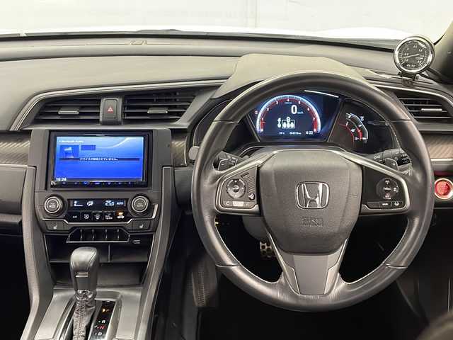 ホンダ シビック ハッチバック 道央・札幌 2018(平30)年 6.5万km ホワイトオーキッドパール /社外ナビ：MDV-D504BT/（CD/DVD/SD/BT/ラジオ/フルセグ）//レーダークルーズコントロール//LEDヘッドライト//衝突被害軽減システム//アイドリングストップ//横滑り防止機能//レーンキープアシスト//アイドリングストップ//社外ドライブレコーダー//ビルトインETC//オートライト//フォグライト//オートエアコン//スペアキー