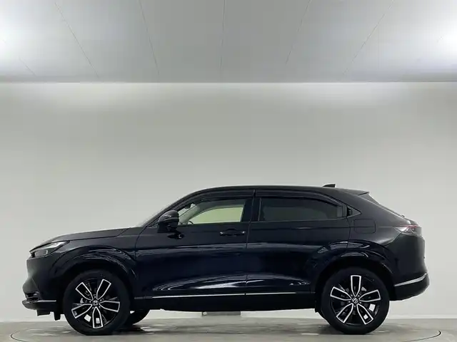 ホンダ ヴェゼル ハイブリッド e:HEV Z 愛媛県 2023(令5)年 1.8万km クリスタルブラックパール 純正９インチナビ　Ｂｌｕｅｔｏｏｔｈ　バックカメラ　レーダークルーズコントロールシートヒーター　ブラインドスポットモニター　ハーフレザーシート　ダウンヒルアシストコントロール　置くだけ充電　ETC