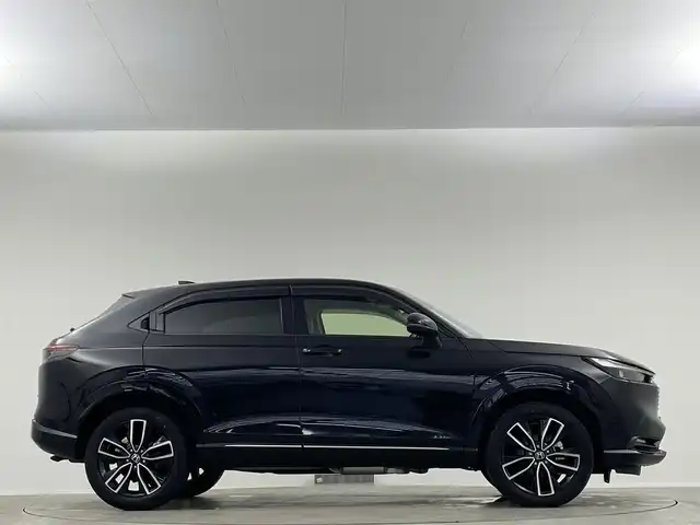 ホンダ ヴェゼル ハイブリッド e:HEV Z 愛媛県 2023(令5)年 1.8万km クリスタルブラックパール 純正９インチナビ　Ｂｌｕｅｔｏｏｔｈ　バックカメラ　レーダークルーズコントロールシートヒーター　ブラインドスポットモニター　ハーフレザーシート　ダウンヒルアシストコントロール　置くだけ充電　ETC