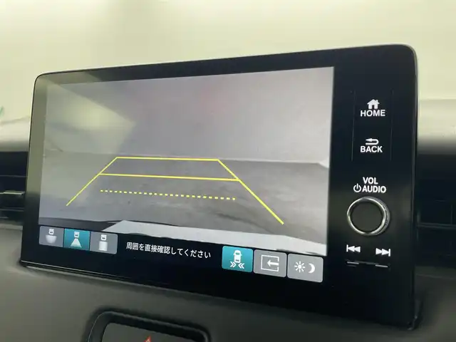ホンダ ヴェゼル ハイブリッド e:HEV Z 愛媛県 2023(令5)年 1.8万km クリスタルブラックパール 純正９インチナビ　Ｂｌｕｅｔｏｏｔｈ　バックカメラ　レーダークルーズコントロールシートヒーター　ブラインドスポットモニター　ハーフレザーシート　ダウンヒルアシストコントロール　置くだけ充電　ETC