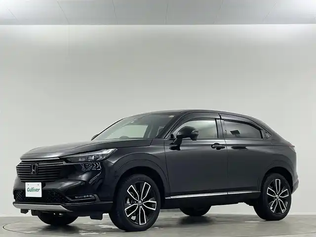ホンダ ヴェゼル ハイブリッド e:HEV Z 愛媛県 2023(令5)年 1.8万km クリスタルブラックパール 純正９インチナビ　Ｂｌｕｅｔｏｏｔｈ　バックカメラ　レーダークルーズコントロールシートヒーター　ブラインドスポットモニター　ハーフレザーシート　ダウンヒルアシストコントロール　置くだけ充電　ETC